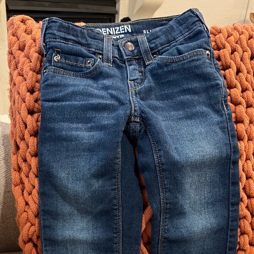 Levi’s Slim adjustable waist size 4 regular denim jeans.